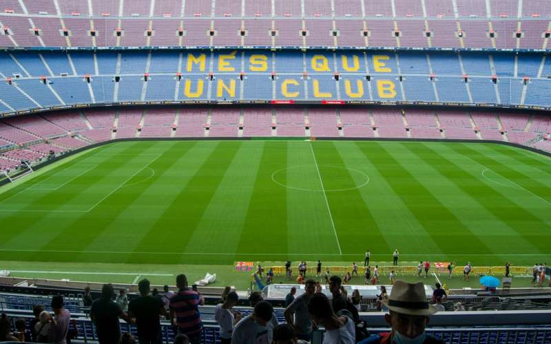 camp_nou_fc_barcelona_stadium.jpg "Camp Nou, the largest stadium in Europe, home to FC Barcelona, showcasing vibrant fan experience and historic football tradition."